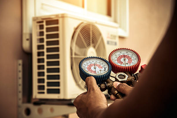 Professional Hvac technician working in Bellport, NY
